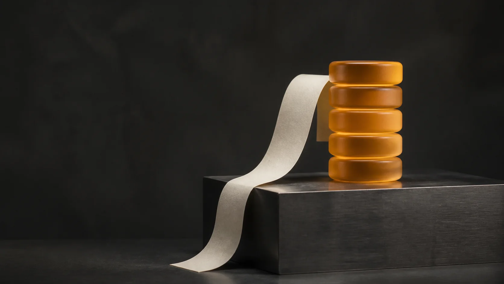 Warm amber glass tokens beside a paper receipt